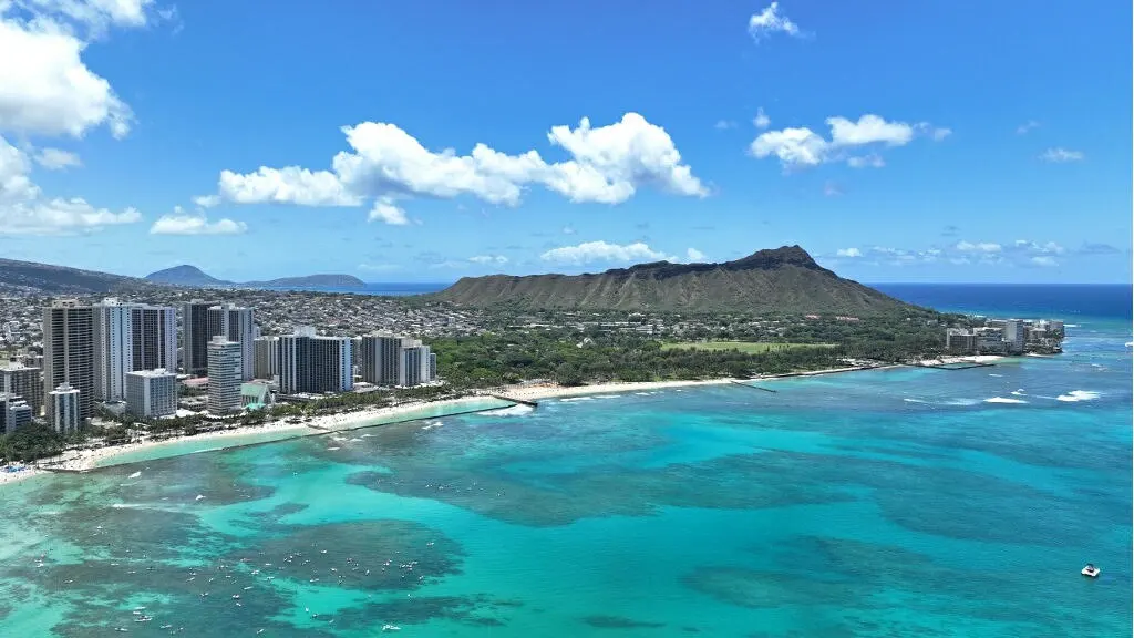 Waikīkī coastline and Diamond Head viewed from above